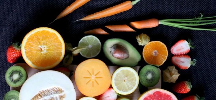 sliced vegetable and fruits on board