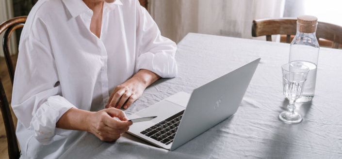 Cropped man using the laptop
