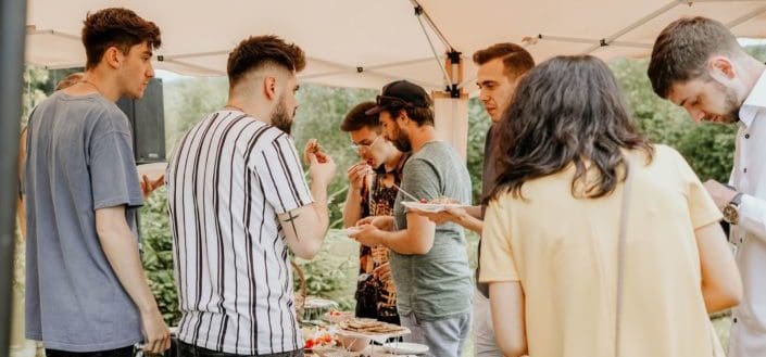 Group of people eating together